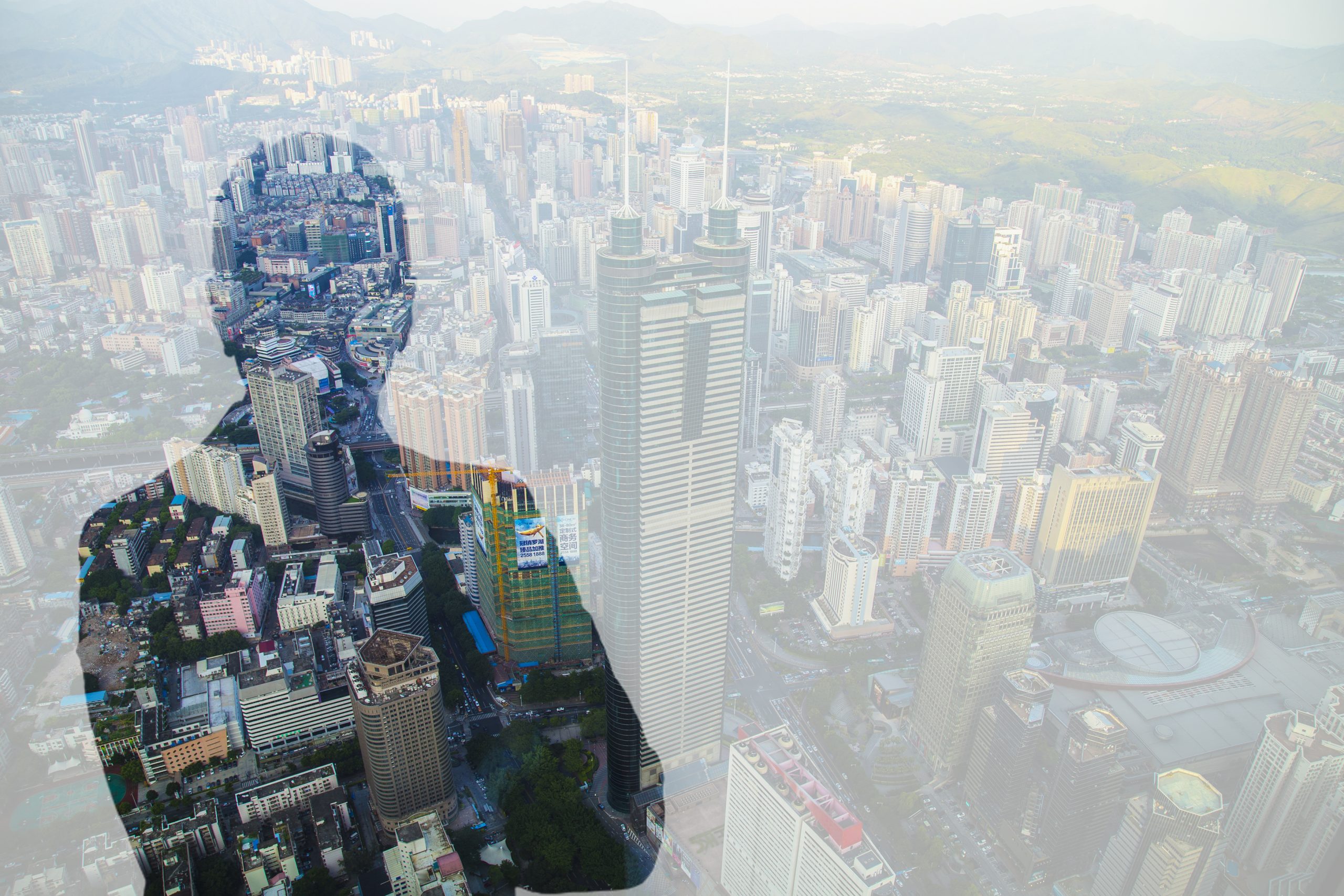 A megacity is behind the window, shadow of a business people, the image of the decision market on the lasts floor of a skyscraper.